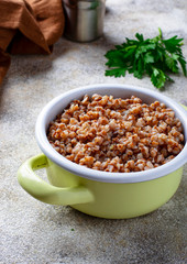 Buckwheat porridge in green pot
