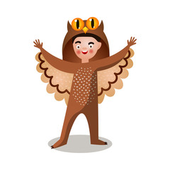 Cute happy boy in scary forest owl costume