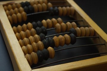 quadrangle frame abacus, item from wood, black background