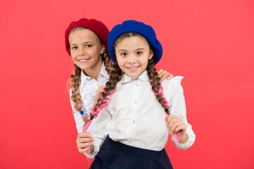 Our friendship will last forever. Adorable small friends smiling on pink background. Happy schoolgirls enjoying friendship. Little children celebrating friendship day. Bonds of friendship