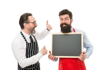 Join us. Hiring restaurant staff. Men bearded informing. Men bearded bartender in apron hold blank chalkboard. Bartender with blackboard advertisement. Hipster bartender show blackboard copy space