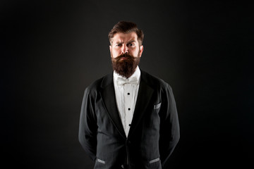 Official event dress code. Male fashion. Classic style. Classic never out of trend. Menswear classic outfit. Bearded man with bow tie. Well dressed and scrupulously neat. Hipster formal suit tuxedo
