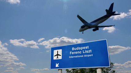 Obraz premium Plane landing in Budapest Ferenc Liszt with signboard