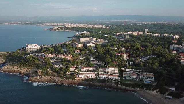 Flying over the coastline in Salou, (Costa Dorada), Catalonia. Summer destination in Spain