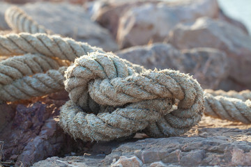 Fototapeta na wymiar naval rope on a pier