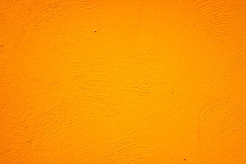 Orange painted wall with background and texture.