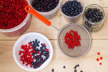 Berries from his garden. Garden berries. Berries from the bushes. Red currant black currant gooseberry. Variety of berries.