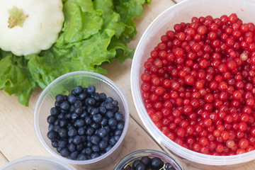 Berries from his garden. Garden berries. Berries from the bushes. Red currant black currant gooseberry. Variety of berries.