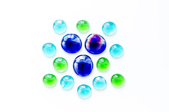 Shiny glass stones for decoration, creativity and craft on white background top view
