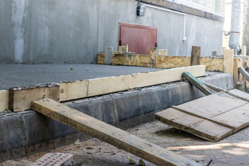 Pouring the concrete base of the house. Formwork Home construction. Technology pouring concrete. Restoration of formwork of a multi-storey building.