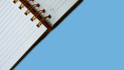 Empty Template Diary,calendar and agenda for planner timetable,appointment,organization,management. Notebook on a blue background,isolated. Close up. Template for weekly and daily meal planner.Design.