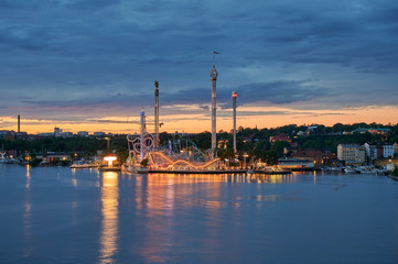 Fototapeta na wymiar Gröna lund the amusement park in Stockholm at sunset