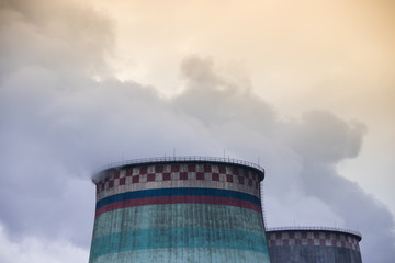 Smoke from the pipe of a thermal power plant. Smoke in the sky. Air pollution. Bad ecology.