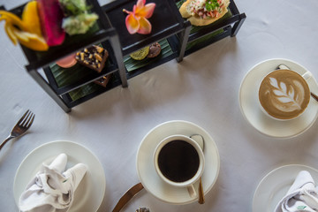 Beautiful elegant afternoon tea arrangement on the table
