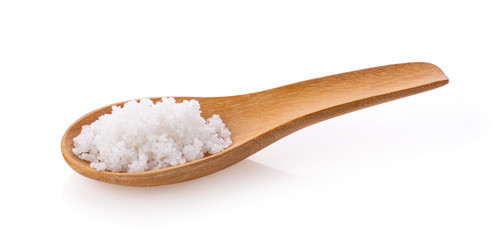 Fototapeta na wymiar salt in wood spoon isolated on white background