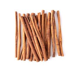 Cinnamon sticks isolated on white background. Top view