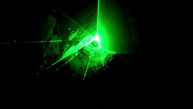 Laser Lights Hologram Show shows some colored laser rays flashing in different lines and shapes on a black background. They form some stunning patterns that can add great value to your videos. 