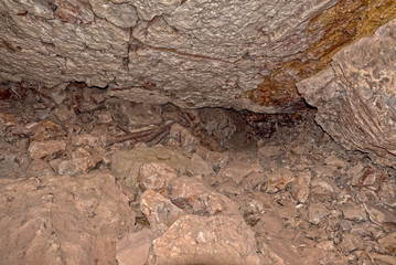 View of a tunnel leading to the Mystery Room in Grand Canyon Caverns. This area has no ambient light, a flash was required. Located near Peach Springs AZ.