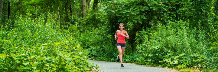 Run runner woman exercising outdoor in city park green nature background panoramic banner fit...