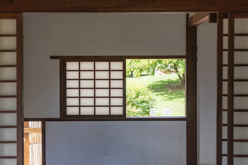 Window of japanese tea house looking out into garden