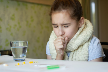 little girl with fever and sneezes