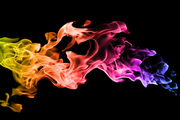 Movement of colorful smoke on black background.