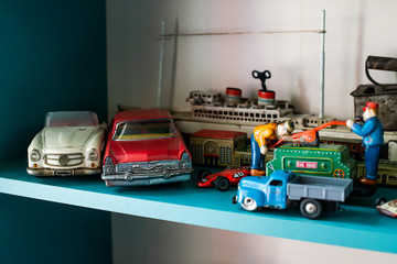 Old vintage toys on shelf.