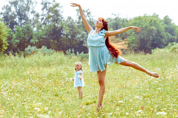 mom dancing with her daughter