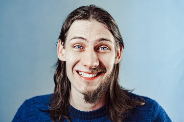 the guy with the beard on half his face