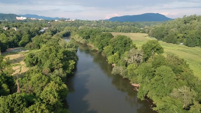 Aerial footage of the French Broad river at Carrier Park in Asheville, NC.