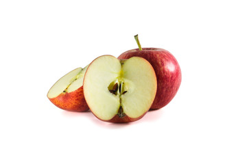 A full ripe fresh red apple with two halves isolated on white background