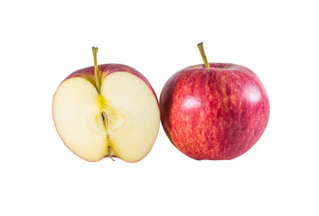 A full ripe fresh red apple and a half isolated on white background