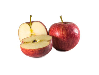A full ripe fresh red apple with two halves isolated on white background