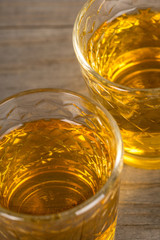 homemade sweet wine in glasses on wooden table