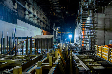 Fototapeta premium industrial pipes machinery and wind turbine at a power plant