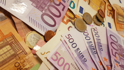 euro banknotes and coins