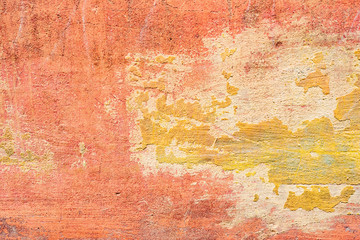 Texture of a concrete wall with cracks and scratches which can be used as a background