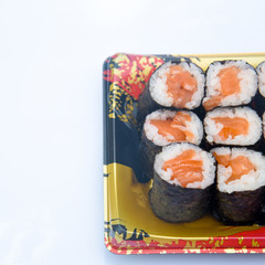 Sushi Roll with salmon on the white background .Food abstract background