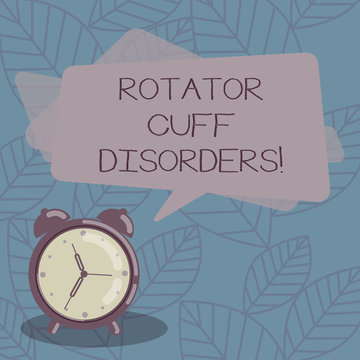 Writing note showing Rotator Cuff Disorders. Business photo showcasing tissues in the shoulder get irritated or damaged Blank Rectangular Color Speech Bubble Overlay and Analog Alarm Clock