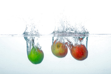 Falling Fruits Into Clean Water 