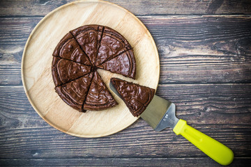 Nutella Brownie with americano coffee and coffee bean on the wood table