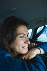 Portrait of a brunette with long hair.