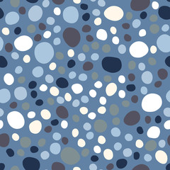 Abstract pebble seamless pattern on blue background.