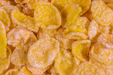 Background of the many yellow cornflakes. Healthy eating