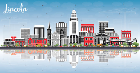 Lincoln Nebraska City Skyline with Color Buildings, Blue Sky and Reflections.