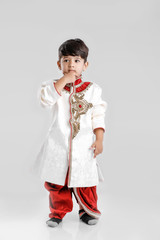 Cute Child in ethnic wear and giving multiple expression 