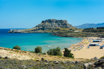 Agathi Beach Rhodes Greece Europe. Panorama with rocks golden sand and clear blue water