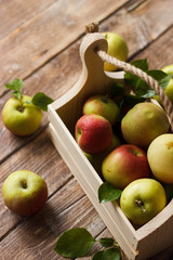 Ripe apples in wooden box. Top view with space for your text