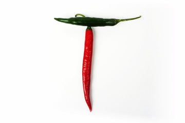 English alphabet. Letter T made of fresh chili pepper isolated on white background. Uppercase letter.