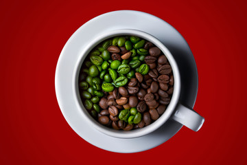 Coffee cup with raw and roasted beans on red background. yin-yang. Top view. coffee in the form of Yin Yang top view
